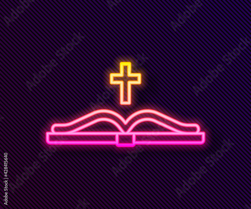 Glowing neon line Holy bible book icon isolated on black background. Vector