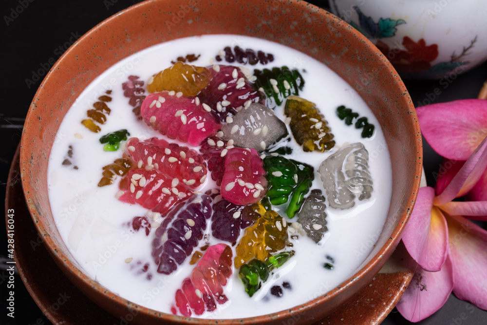 Krong Krang Multi-colored coconut milk sprinkled white sesame desserts top view Krong Krang Multi-colored coconut milk sprinkled white sesame desserts top view
