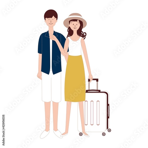スーツケースを持って旅行する男女