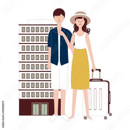 スーツケースを持って旅行する男女　ホテル
