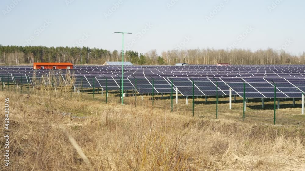 A huge field of solar panels. solar energy. Energy from the sun is a lot of panels. Solar panels in a huge amount outdoors in the open air A huge field of solar panels. solar energy. Energy from the sun is a lot of panels. Solar panels in a huge amount outdoors in the open air
