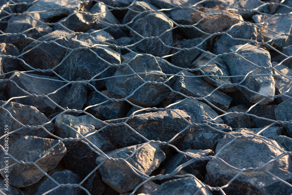 the texture of stone and metal mesh
