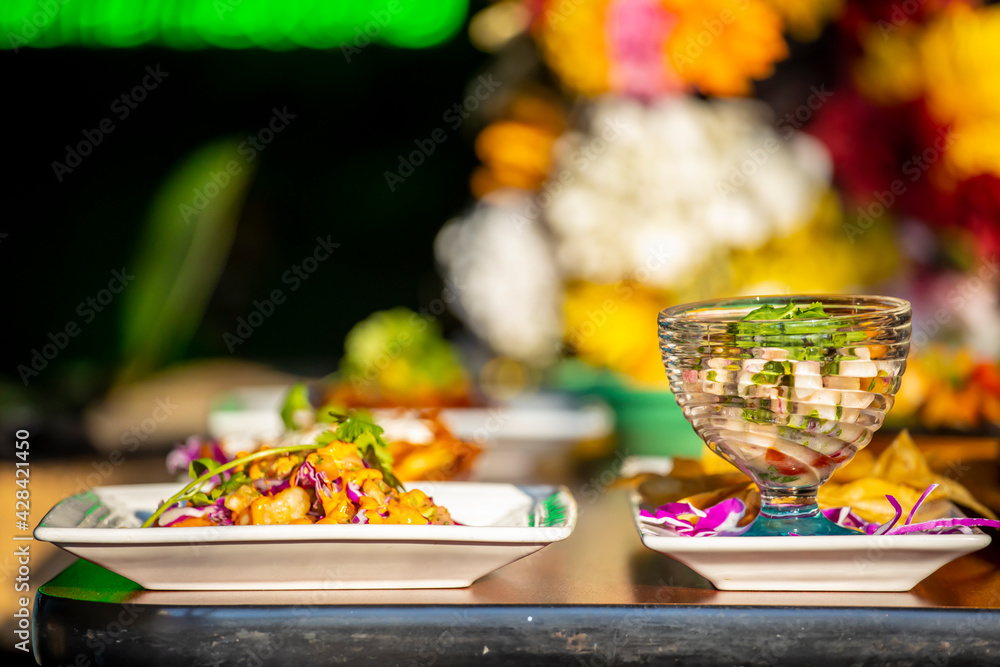 close up view of traditional Mexican salsa presented in a elegant manner at a local Hispanic restaurant. the dipping sauce is brightly colored and full of flavor. close up view of traditional Mexican salsa presented in a elegant manner at a local Hispanic restaurant. the dipping sauce is brightly colored and full of flavor.