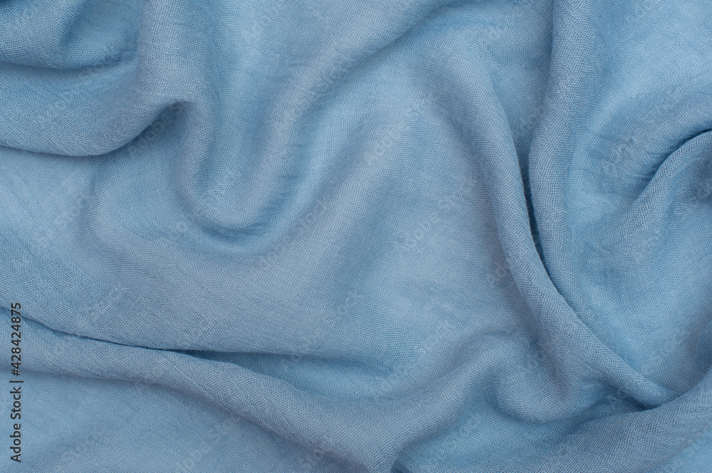 Blue cotton drape fabric. Texture, background Blue cotton drape fabric. Texture, background