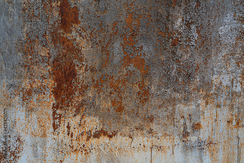 Metallic rusty wall as an abstract background