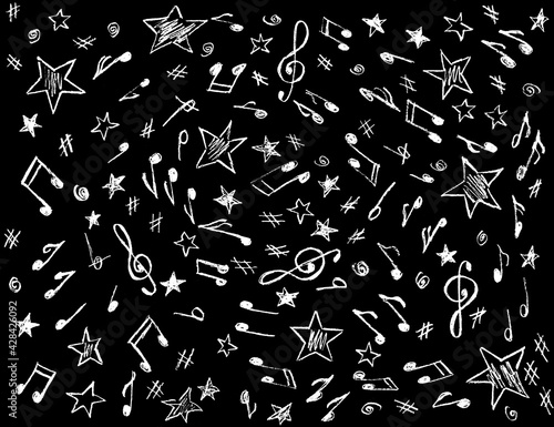 Black background with white painted musical notes and stars.