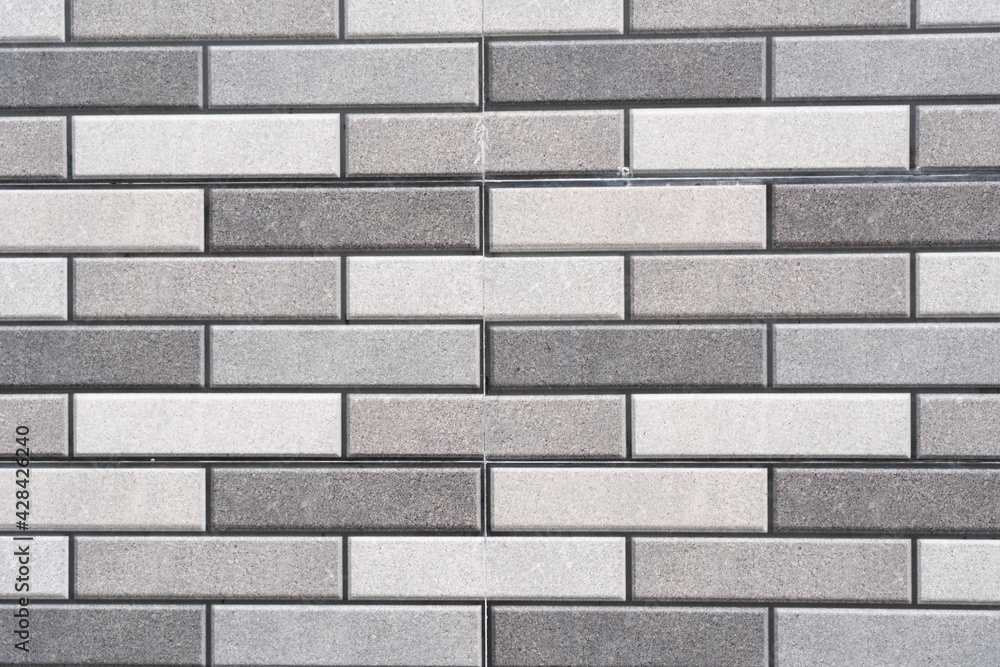 Obraz premium Gray brick wall as an abstract background