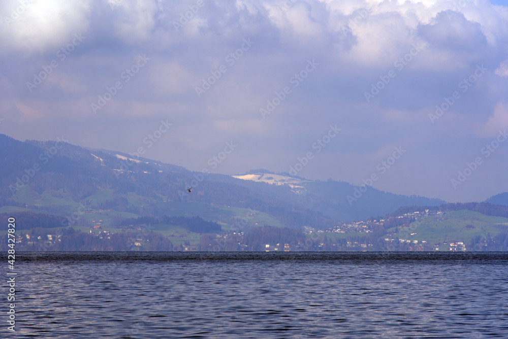 Lake Vierwaldstättersee seen from landing point Vitznau, Lucerne, Switzerland. Photo taken April 14th, 2021.