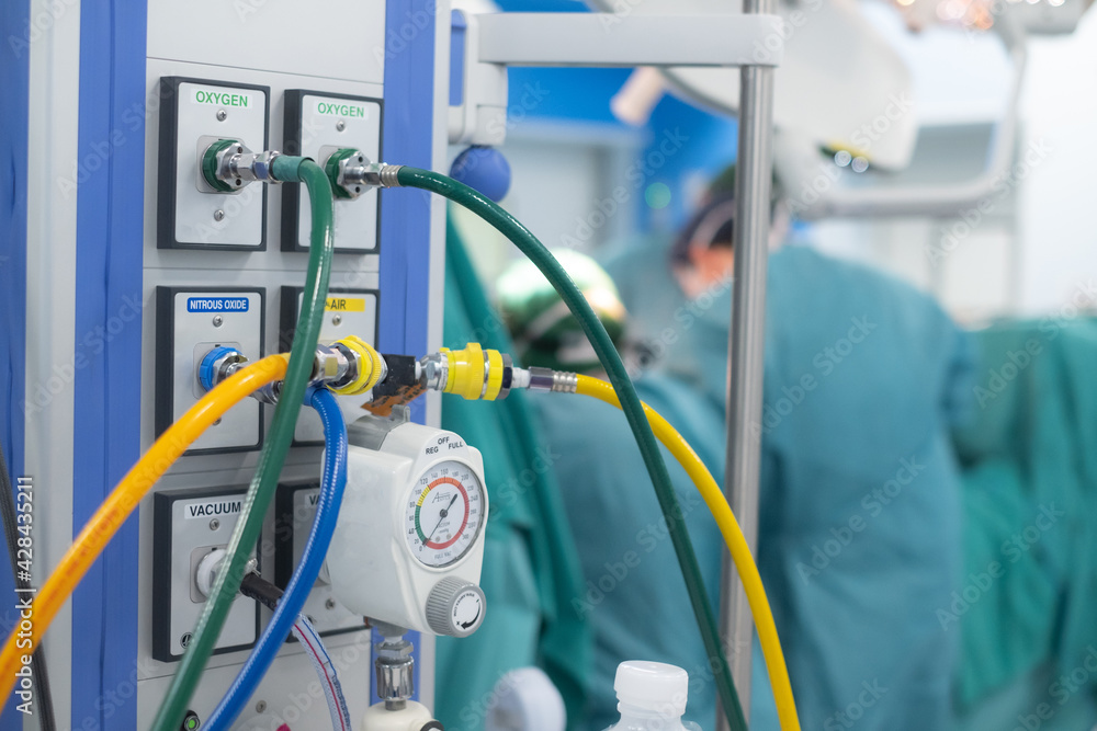 Pipe line oxygen and vacuum adaptor on the wall for helping patient in operating room. Pipe line oxygen and vacuum adaptor on the wall for helping patient in operating room.