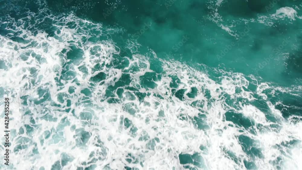 push in tilt up shot from ocean to shore in Maui push in tilt up shot from ocean to shore in Maui