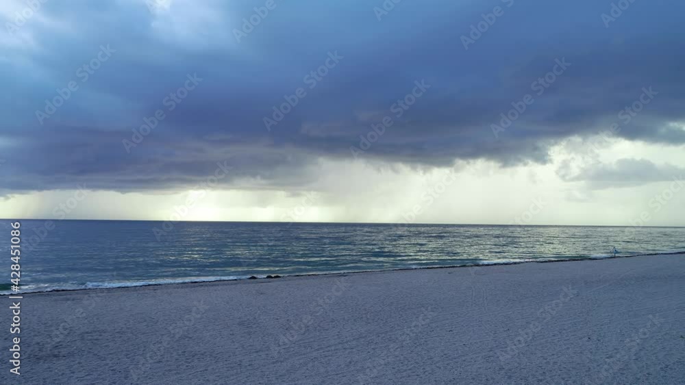 wide shot on ocean with storm clouds over it wide shot on ocean with storm clouds over it