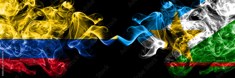 Colombia, Colombian vs Brazil, Brazilian, Roraima smoky mystic flags placed side by side. Thick colored silky abstract smokes flags. Colombia, Colombian vs Brazil, Brazilian, Roraima smoky mystic flags placed side by side. Thick colored silky abstract smokes flags.