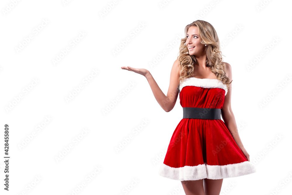 Portrait of a blonde woman dressed in red New Year costume standing isolated over white background. Isolate Portrait of a blonde woman dressed in red New Year costume standing isolated over white background. Isolate