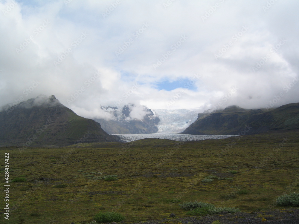 Iceland Vatnajökull ice clouds gras