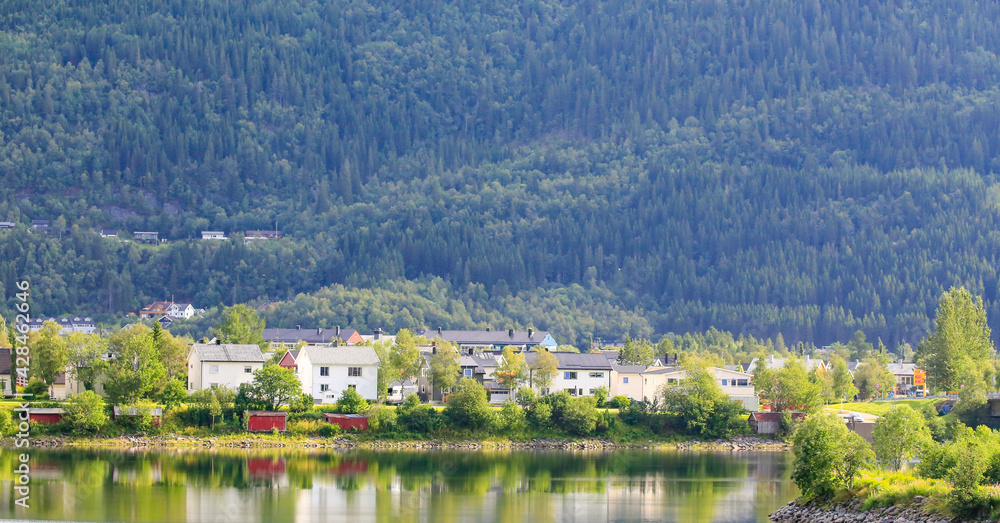Fototapeta premium Part of Mosjøen town`s old buildings along the river Vefsna,Helgeland,Nordland county,Norway,scandinavia,Europe 