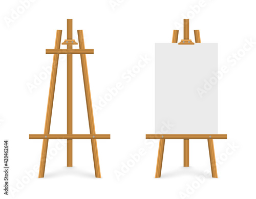 Empty canvas on wooden easel. Wooden brown easel. Blank art board. Mock up white canvas for painting. Easel with vertical poster. Space for your text and design advertising.
