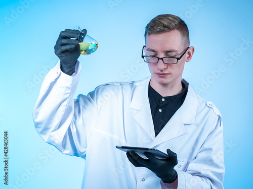 Young scientist in a white ...
