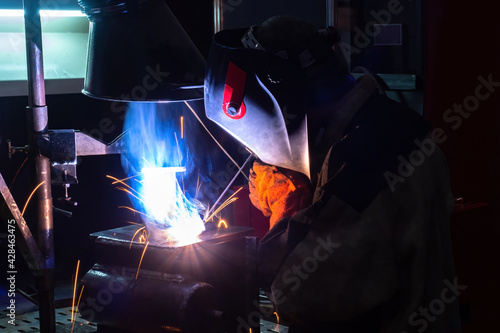 Welder during work. The man...