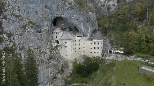 Wallpaper Mural Predjama Castle. Prostojna Slovenia. A castle hidden in a cave in autumn. It is the largest cave castle in the world! Majestic historical castle of Slovenia. Autumn in Slovenia. Torontodigital.ca