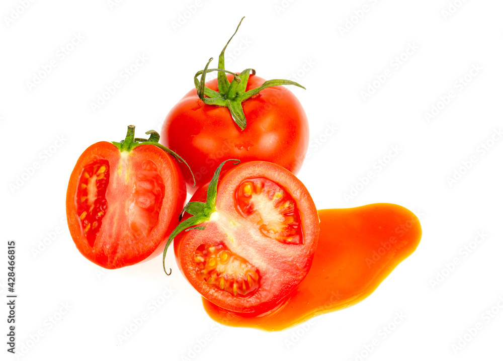 Blot of tomato juice and fresh red tomatoes isolated on white background. Blot of tomato juice and fresh red tomatoes isolated on white background.