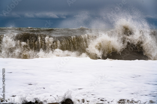 large and powerful sea waves during a storm