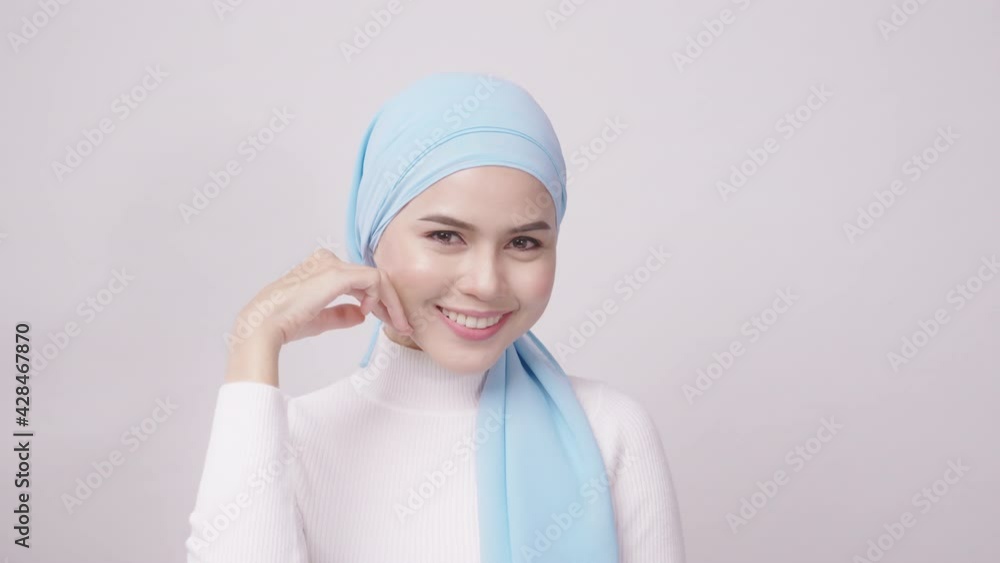 close up of young beautiful muslim woman with hijab isolated on white background studio, muslim beauty skin care concept. close up of young beautiful muslim woman with hijab isolated on white background studio, muslim beauty skin care concept.