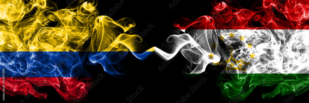 Colombia, Colombian vs Tajikistan smoky mystic flags placed side by side. Thick colored silky abstract smokes flags.