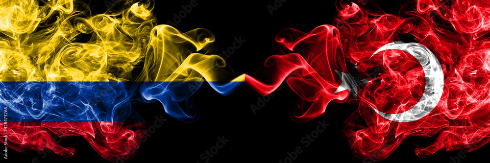 Colombia, Colombian vs Turkey, Turkish, Turk smoky mystic flags placed side by side. Thick colored silky abstract smokes flags.