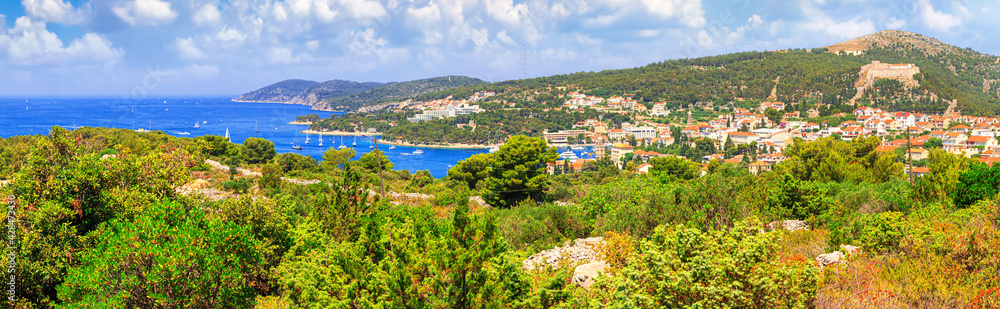 Coastal summer landscape, panorama - view of the town of Hvar, on the island of Hvar, the Adriatic coast of Croatia