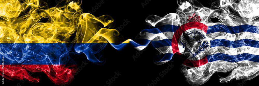 Colombia, Colombian vs United States of America, America, US, USA, American, Cincinnati, Ohio smoky mystic flags placed side by side. Thick colored silky abstract smokes flags. Colombia, Colombian vs United States of America, America, US, USA, American, Cincinnati, Ohio smoky mystic flags placed side by side. Thick colored silky abstract smokes flags.