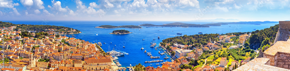 Coastal summer landscape, panorama - top view of the town of Hvar and the City Harbour with marina, on the island of Hvar, the Adriatic coast of Croatia