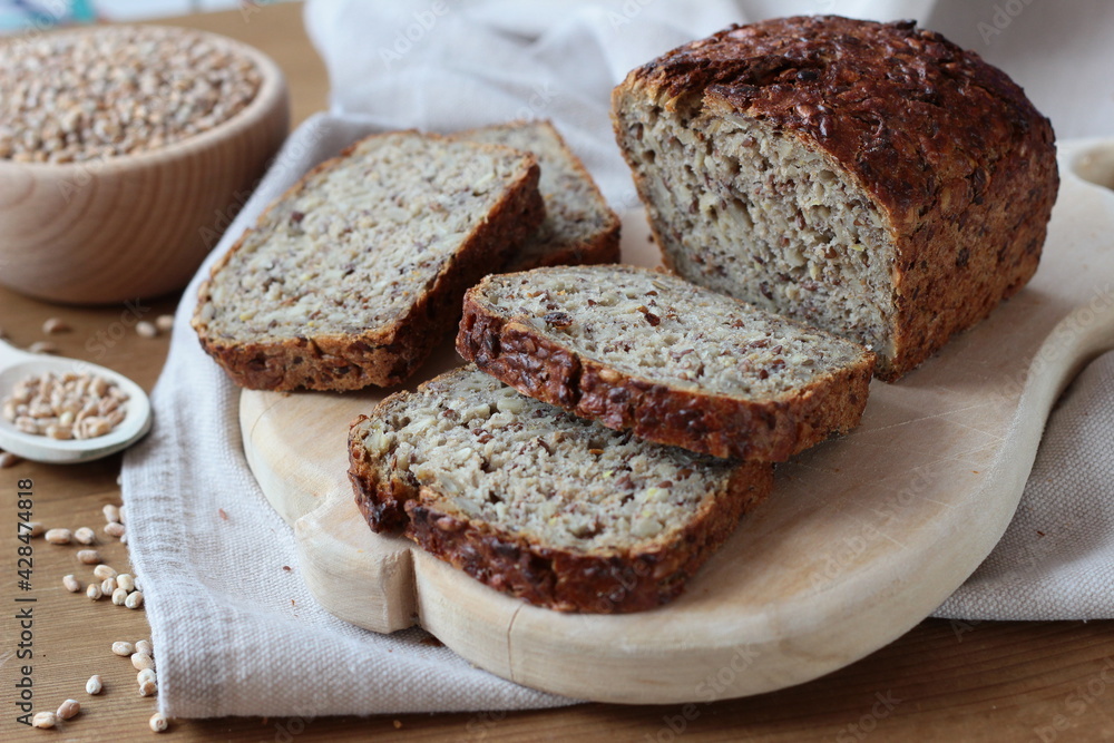 Wholemeal bread and wheat grains Wholemeal bread and wheat grains