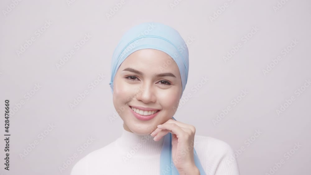 close up of young beautiful muslim woman with hijab isolated on white background studio, Shot in 6K. muslim beauty skin care concept. close up of young beautiful muslim woman with hijab isolated on white background studio, Shot in 6K. muslim beauty skin care concept.