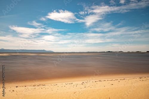 Sand  clouds and lake with blue sky