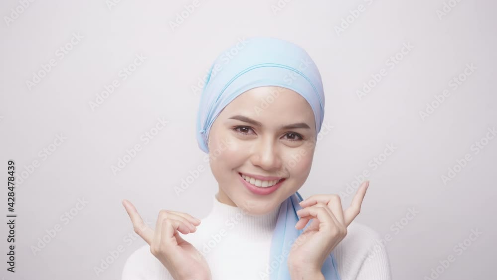 close up of young beautiful muslim woman with hijab isolated on white background studio, Shot in 6K. muslim beauty skin care concept. close up of young beautiful muslim woman with hijab isolated on white background studio, Shot in 6K. muslim beauty skin care concept.