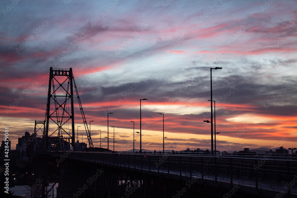 sunset in the city city Florianopolis, Ponte Hercílio Luz, Florianópolis, Santa Catarina, Brazil sunset in the city city Florianopolis, Ponte Hercílio Luz, Florianópolis, Santa Catarina, Brazil