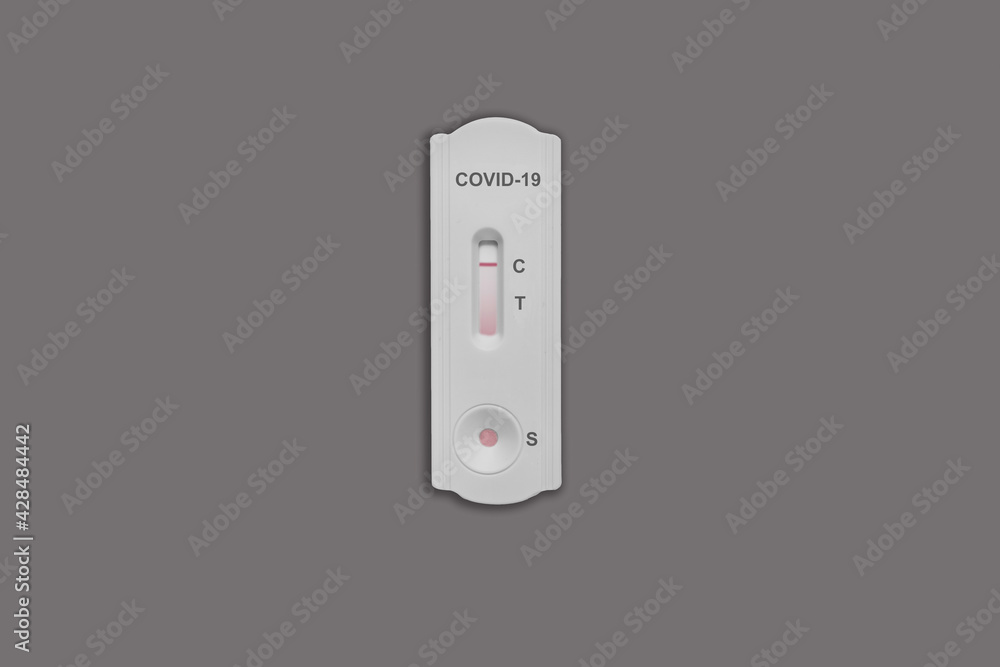 Negative rapid test for covid-19, coronavirus, Sars-2019, top view on gray background Negative rapid test for covid-19, coronavirus, Sars-2019, top view on gray background