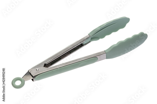 Kitchen tool in the form of tongs made of green plastmass for cooking