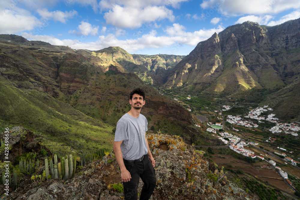 young man contemplates the landscape. Agaete valley. Gran Canaria