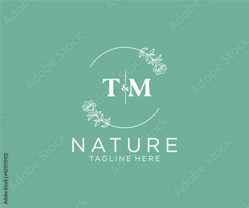 initial TM letters Botanical feminine logo template floral, editable premade monoline logo suitable, Luxury feminine wedding branding, corporate.
