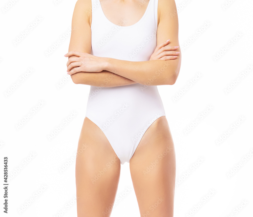 Close-up of a beautiful and fit female figure. Studio photo of young woman's body in swimsuit. Close-up of a beautiful and fit female figure. Studio photo of young woman's body in swimsuit.