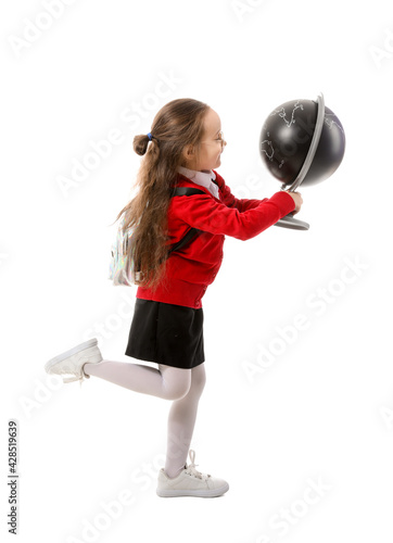 Cute little schoolgirl with...