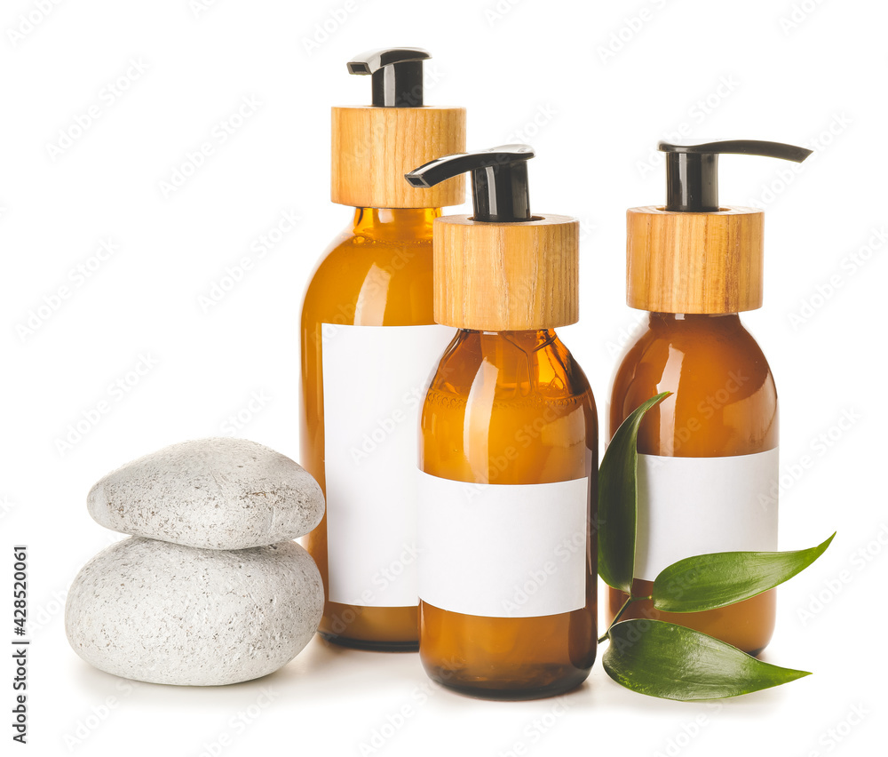 Bottles with natural shampoo on white background Bottles with natural shampoo on white background