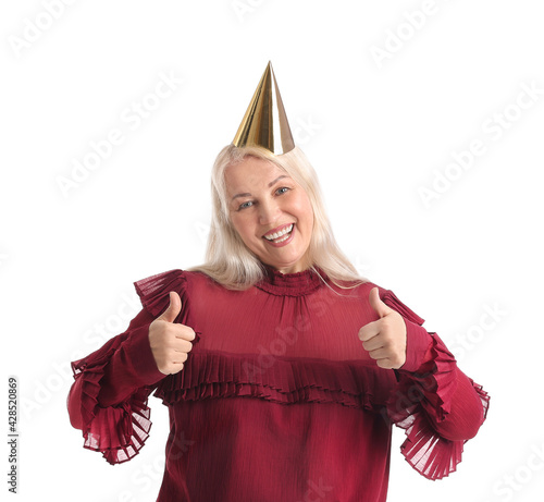 Happy mature woman in party...