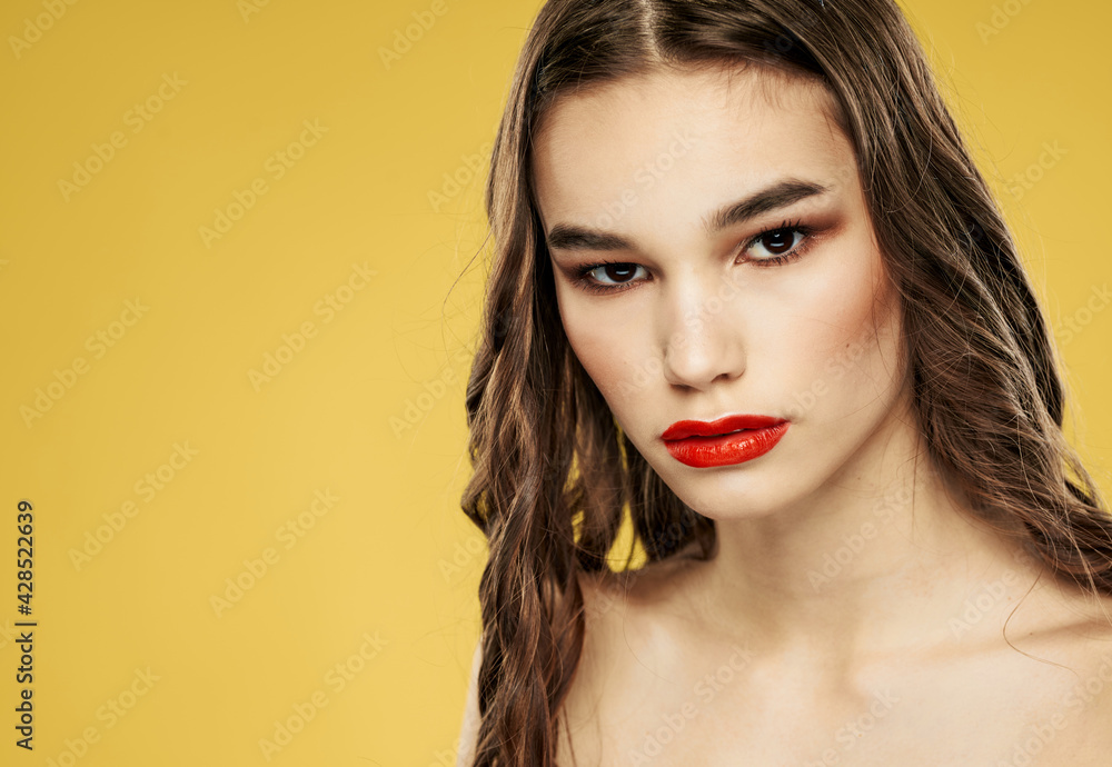 Pretty woman with naked shoulders red lips brunette Pretty woman with naked shoulders red lips brunette