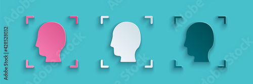 Paper cut Face recognition icon isolated on blue background. Face identification scanner icon. Facial id. Cyber security concept. Paper art style. Vector