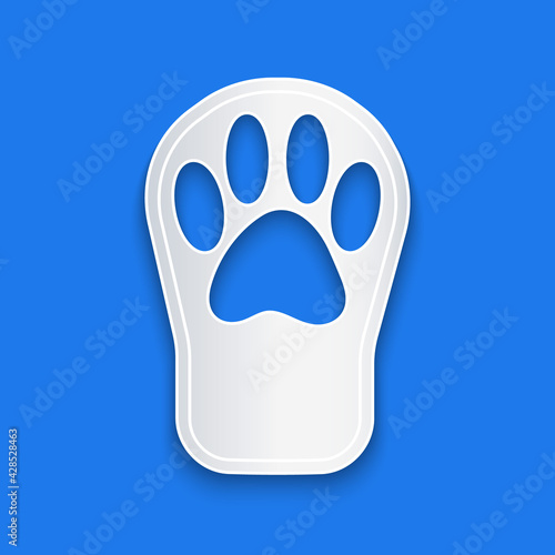 Paper cut Paw print icon isolated on blue background. Dog or cat paw print. Animal track. Paper art style. Vector