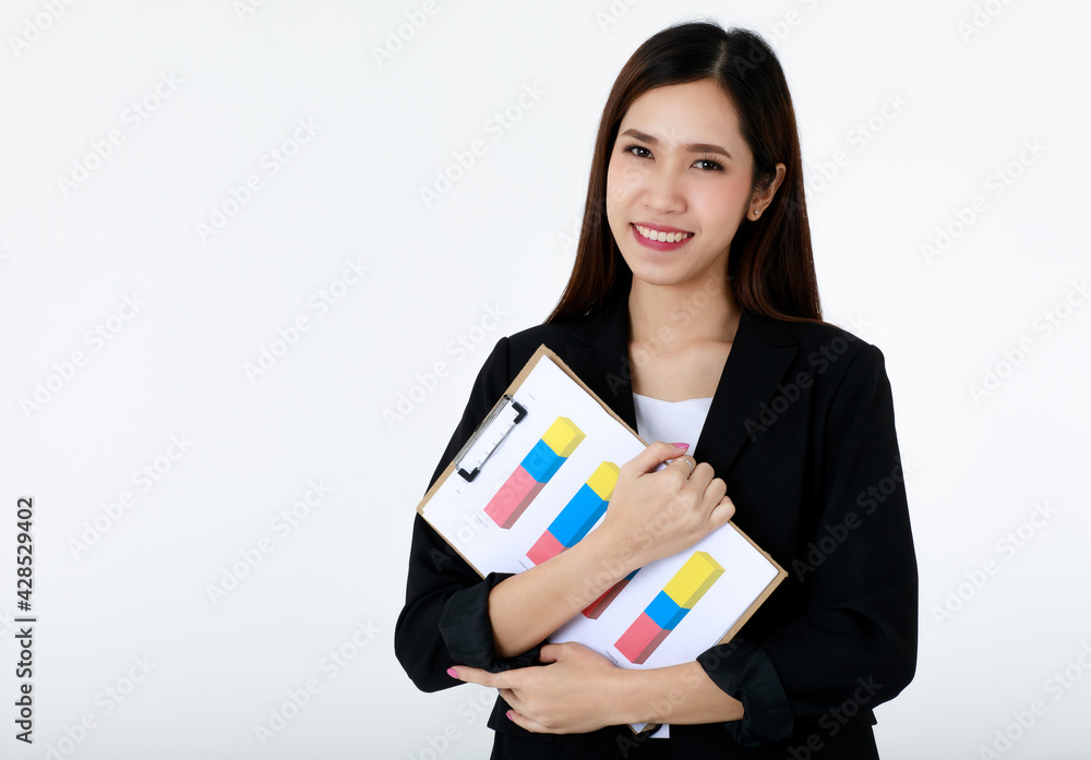 Portrait of asian beautiful business woman with long hair wearing formal suit, smiling with confidence and holding financial or marketing flip chart and graph board with isolated white background. Portrait of asian beautiful business woman with long hair wearing formal suit, smiling with confidence and holding financial or marketing flip chart and graph board with isolated white background.