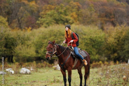 Woman riding horse outdoors fresh air travel landscape © SHOTPRIME STUDIO