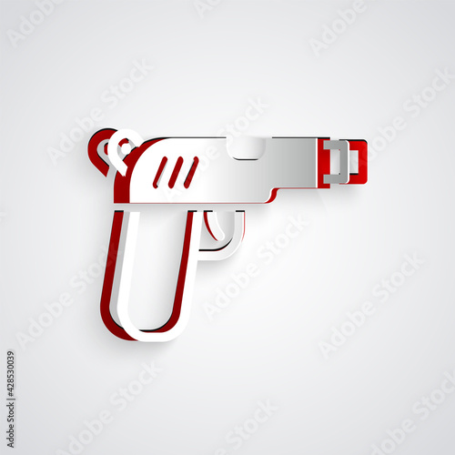 Paper cut Pistol or gun icon isolated on grey background. Police or military handgun. Small firearm. Paper art style. Vector
